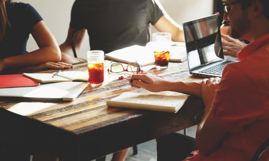 Venture capital team reviewing startup investment pitch